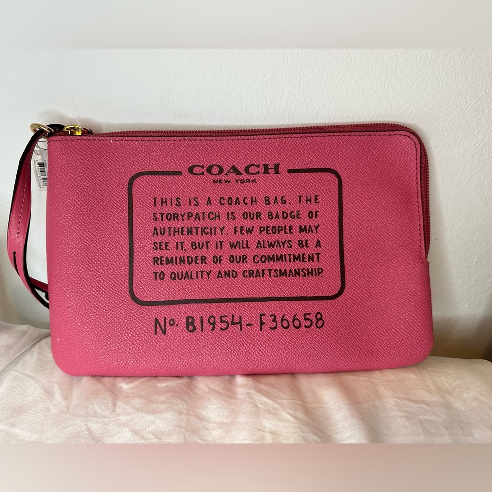 Coach Storypatch pink purse/wristlet
Brand new, never used